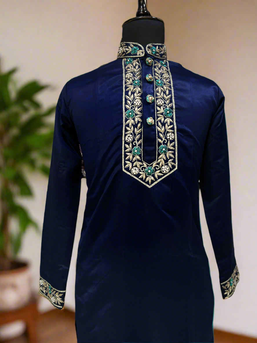 Men's navy blue kurta set featuring intricate hand embroidery.