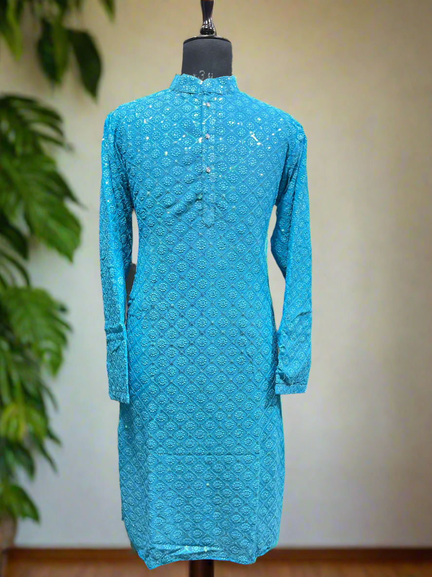 Men’s designer kurta with sequence details and matching pants.