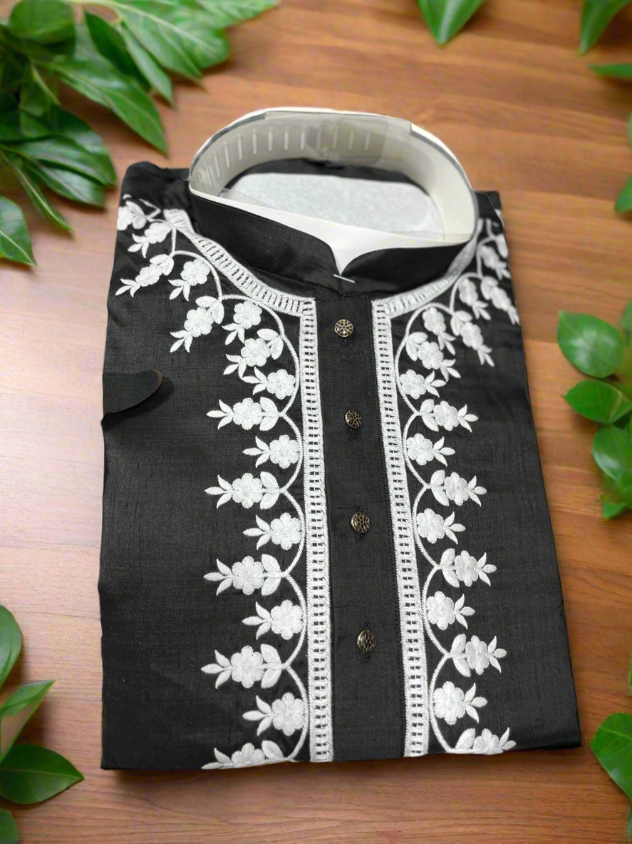 Complete black kurta and pajama ensemble for festive occasions.