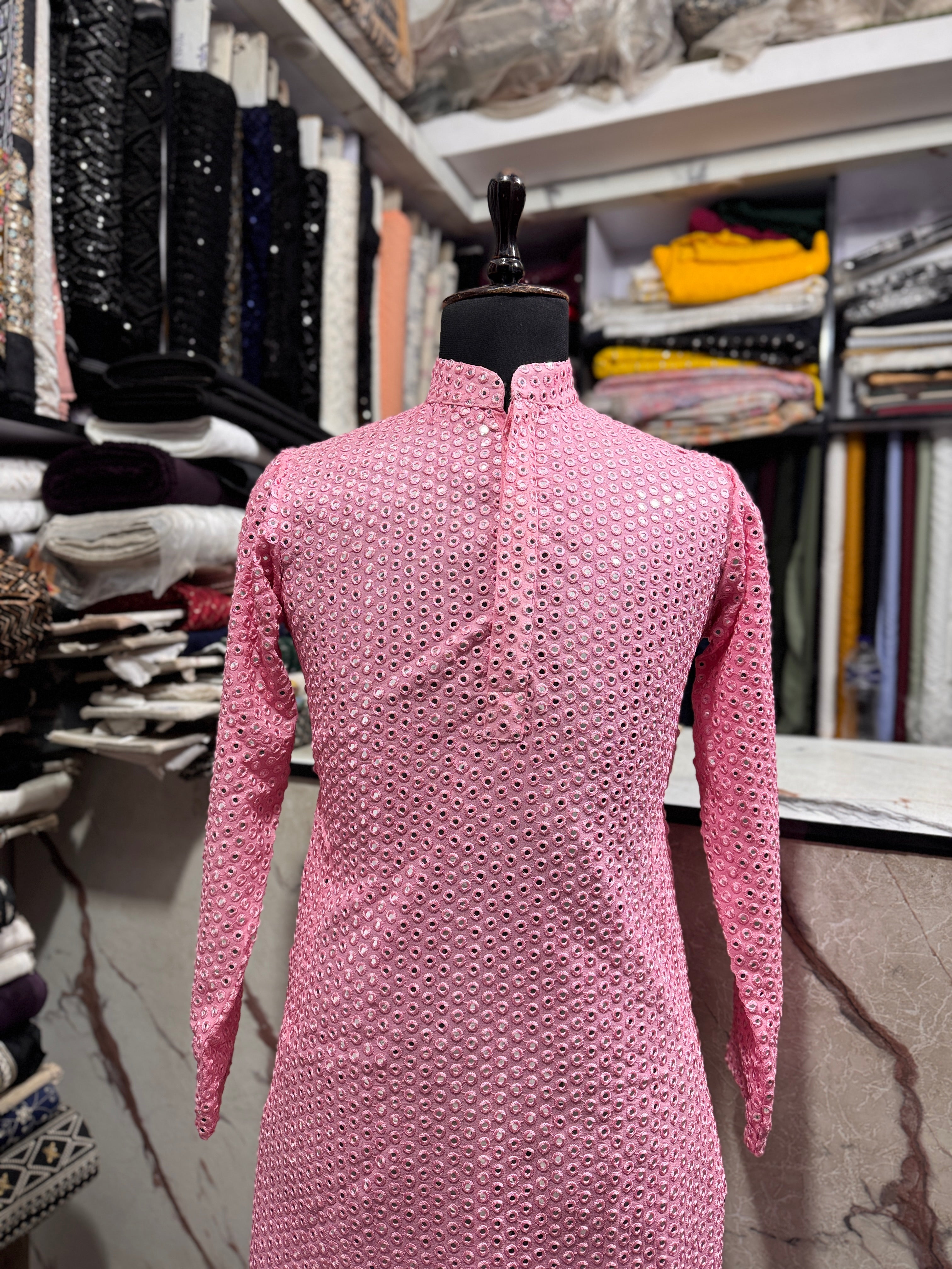 A full-length shot of the kurta set with the pants, highlighting the complete look.

