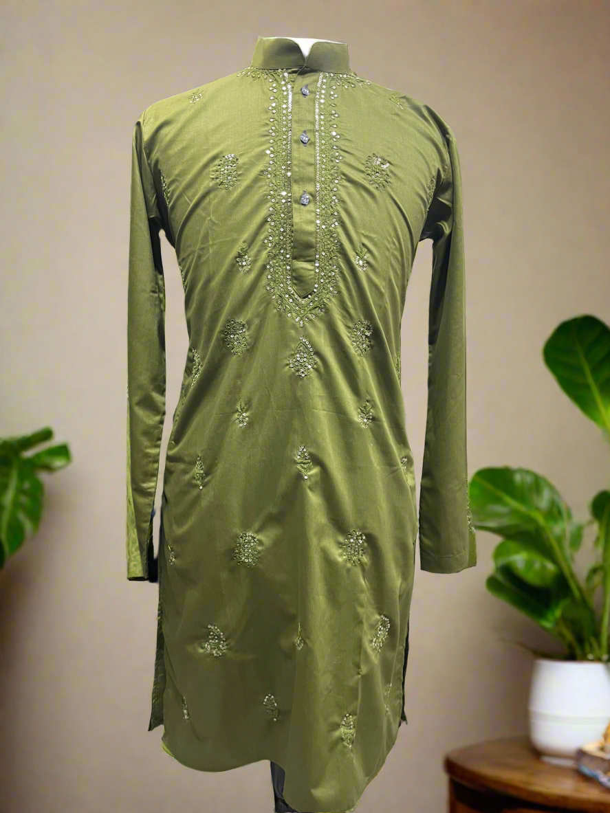 Handcrafted green kurta set for festive celebrations.