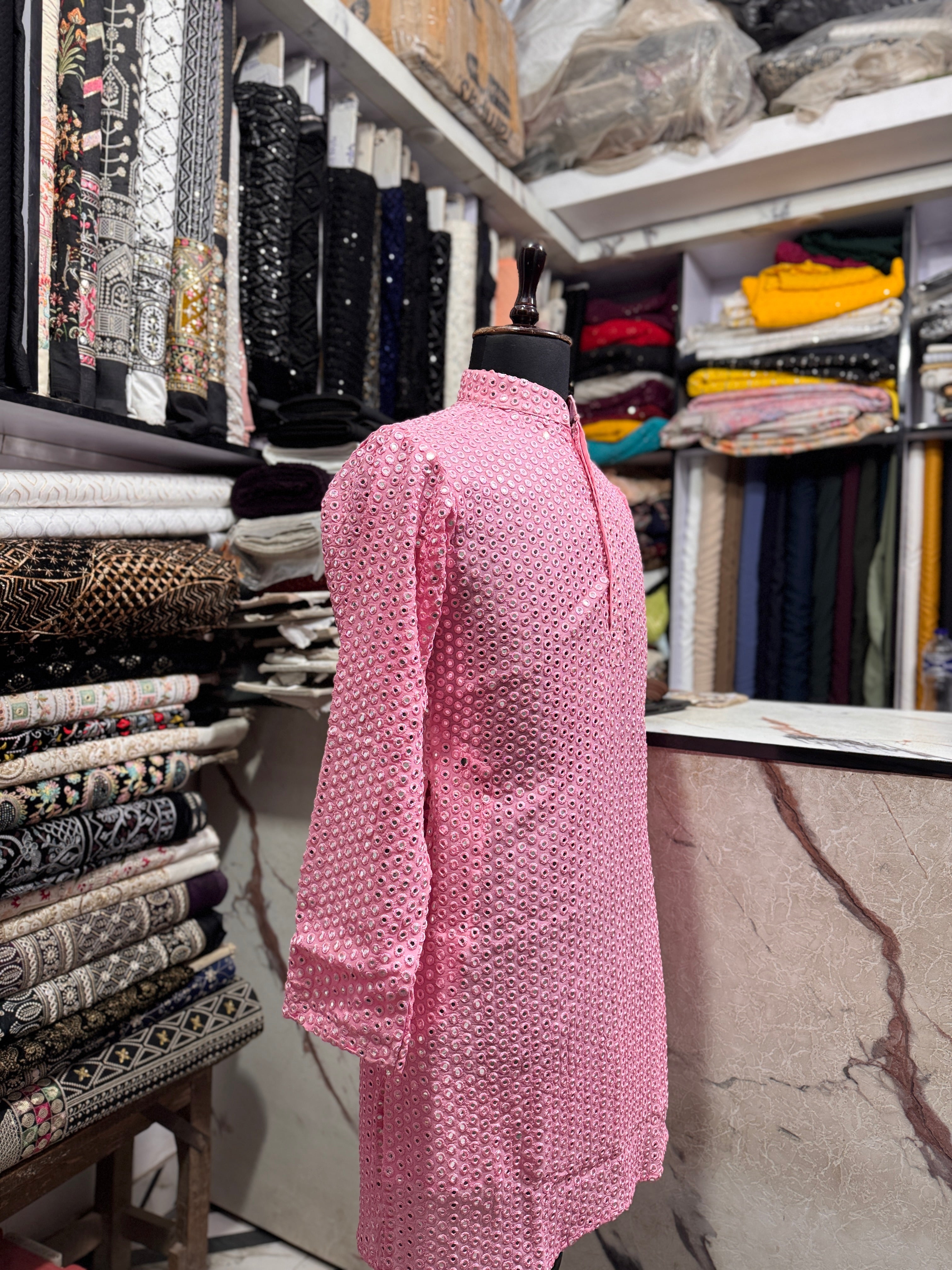 A full-length shot of the kurta set with the pants, highlighting the complete look.

