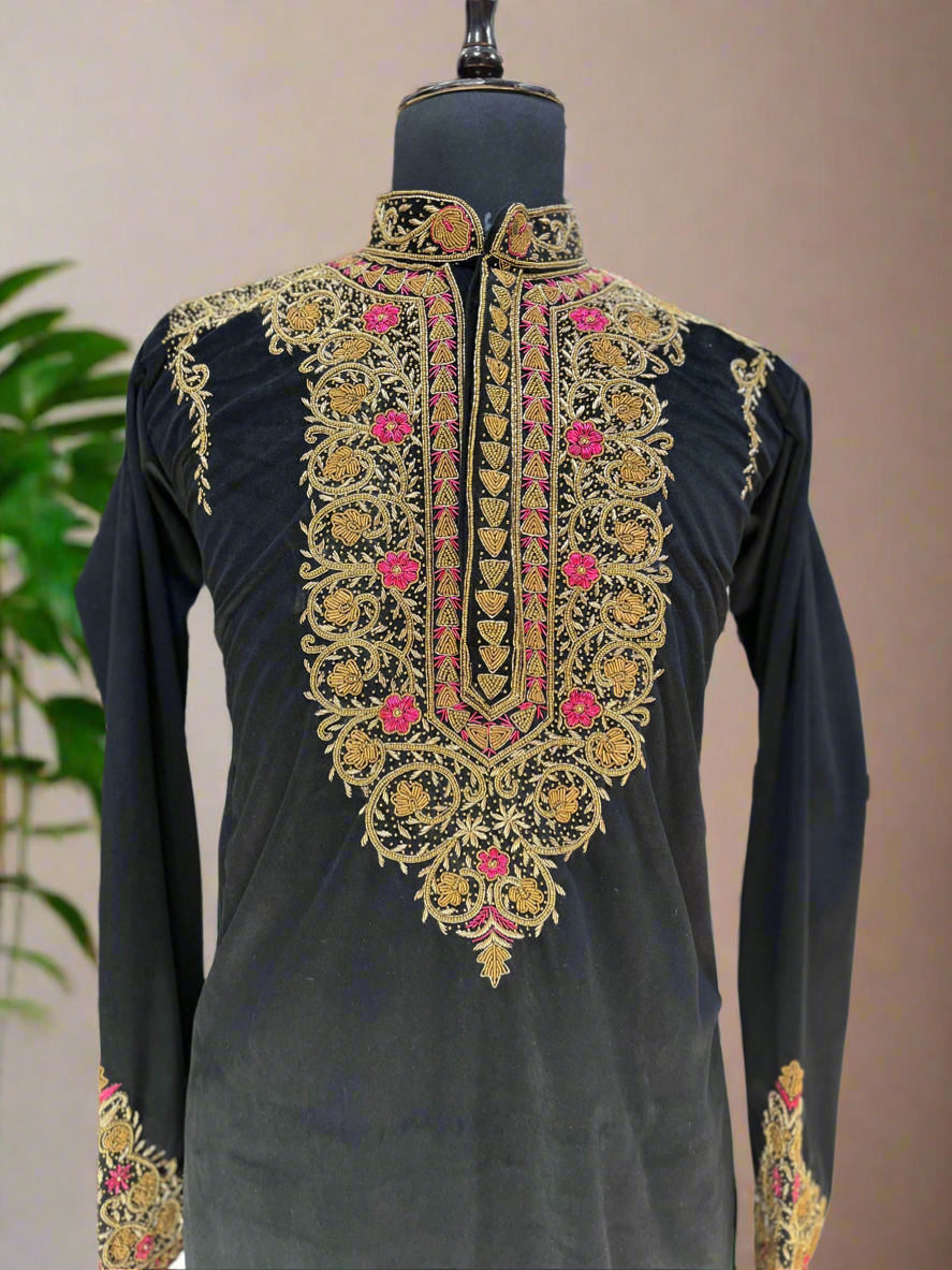 Black velvet kurta with vibrant Zardozi embroidery.