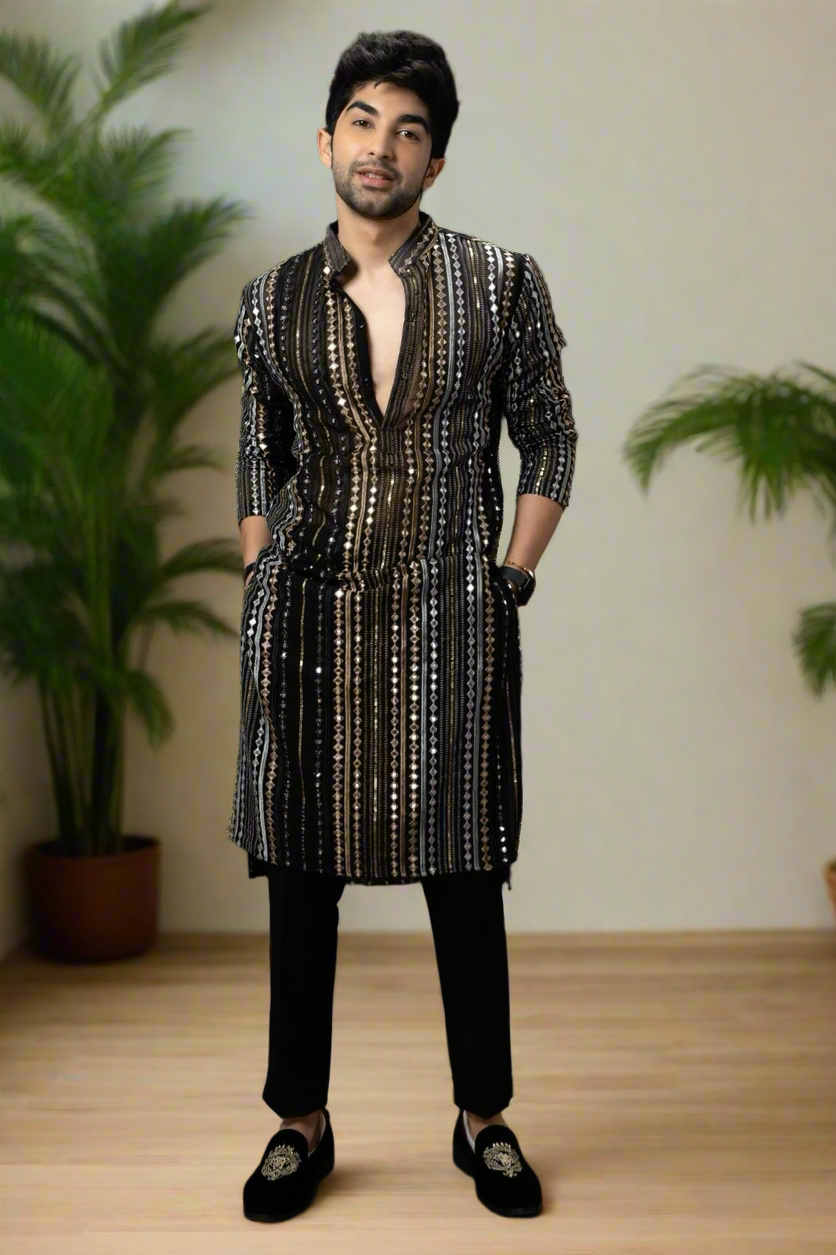 Men's black georgette kurta set with zipper-style pants.