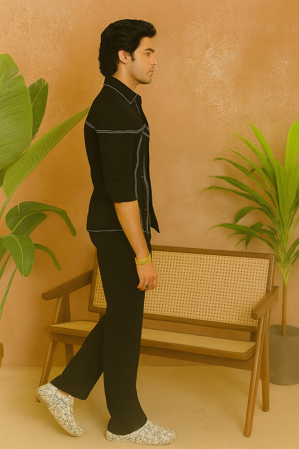 A model in a navy blue formal indo-western set, designed to make a statement at any special occasion.

