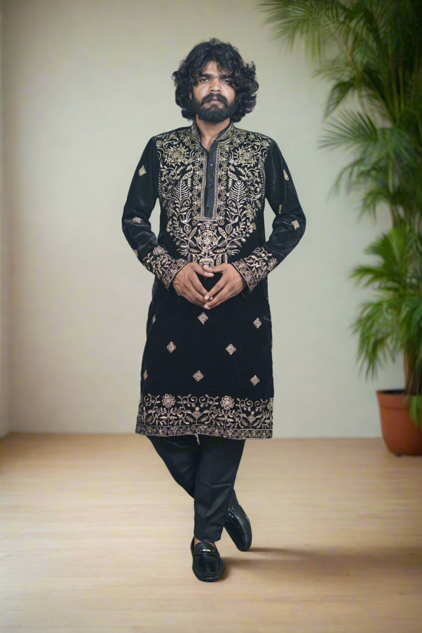 "Elegant black and gold embroidered kurta set for men, ideal for weddings and traditional celebrations."