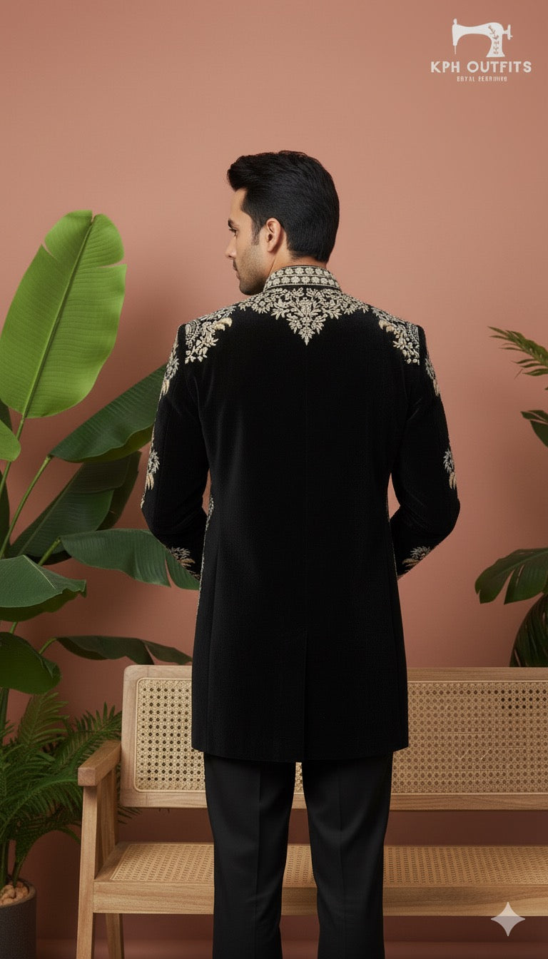 Stylish black velvet Achkan with intricate details work and a sharp fit