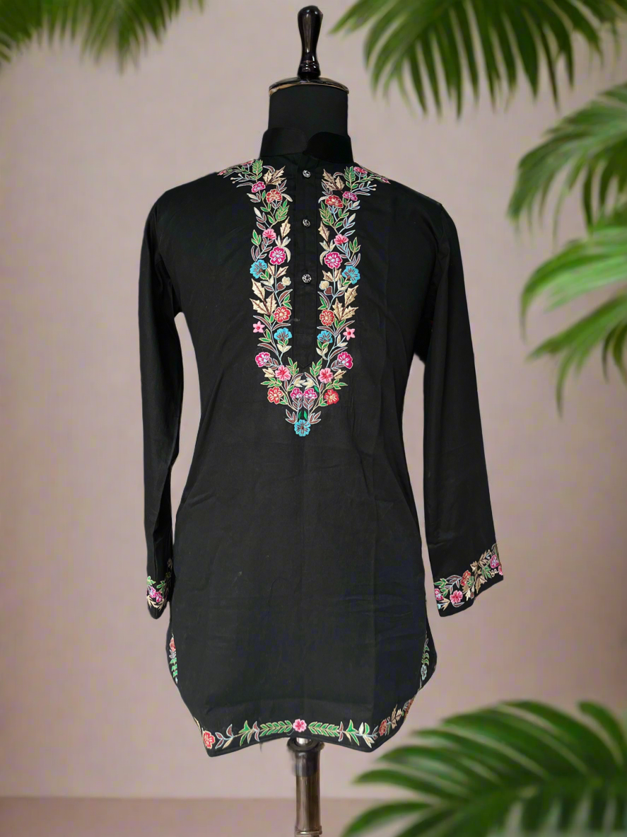 Close-up of the machine-crafted embellishments on the kurta.