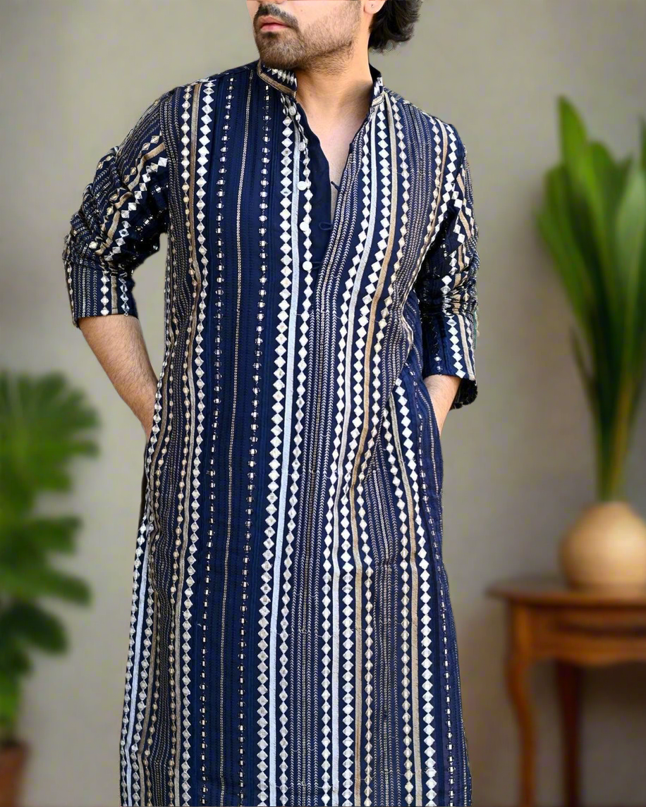 Full view of navy blue designer kurta and zipper pants.