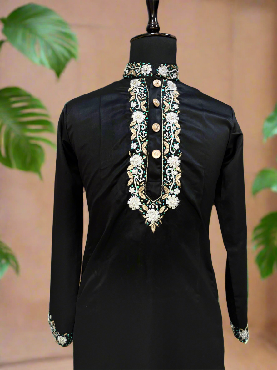 Close-up of intricate Zardozi embroidery on the kurta neckline