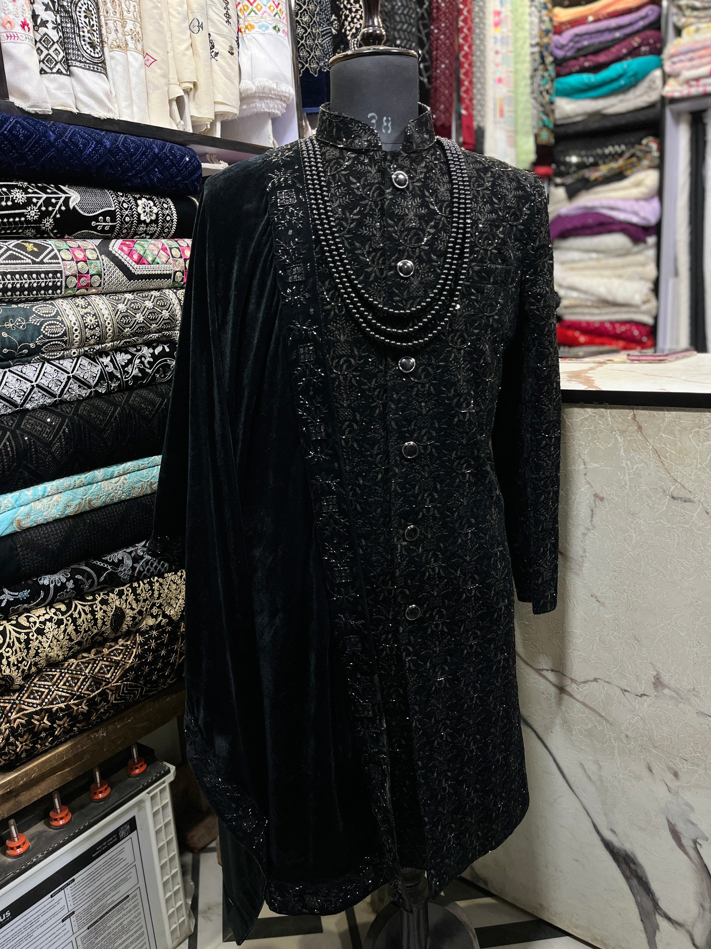 Close-up of Handcrafted Cut Dana Detailing on Men's Black Sherwani