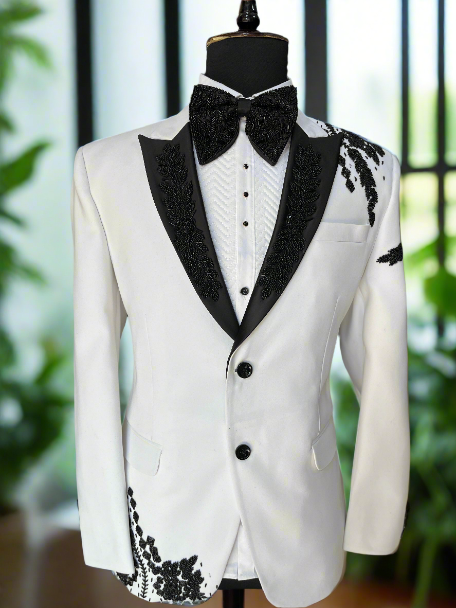 Close-up of Handcrafted Cut Dana Work Detail on White Tuxedo for Men