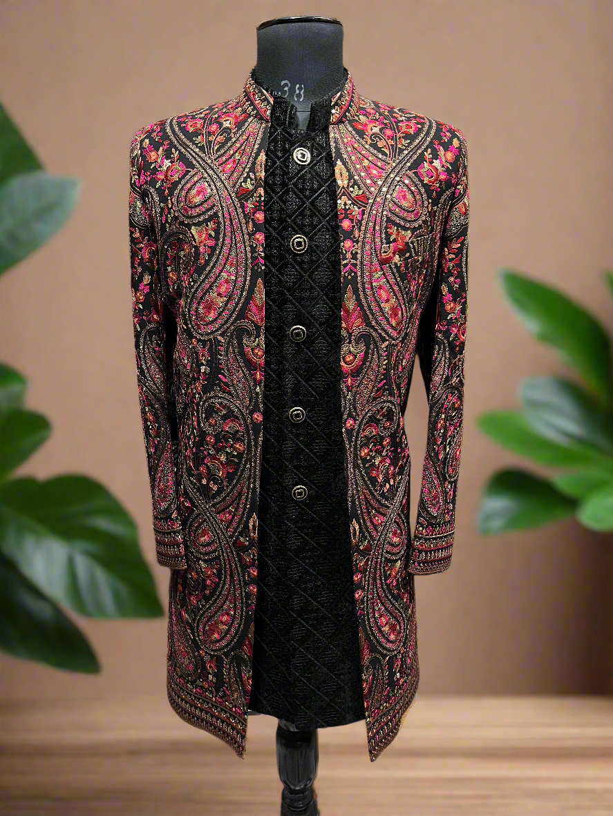 Close-up of Kalamkari embroidery on the black Indo-Western jacket.
