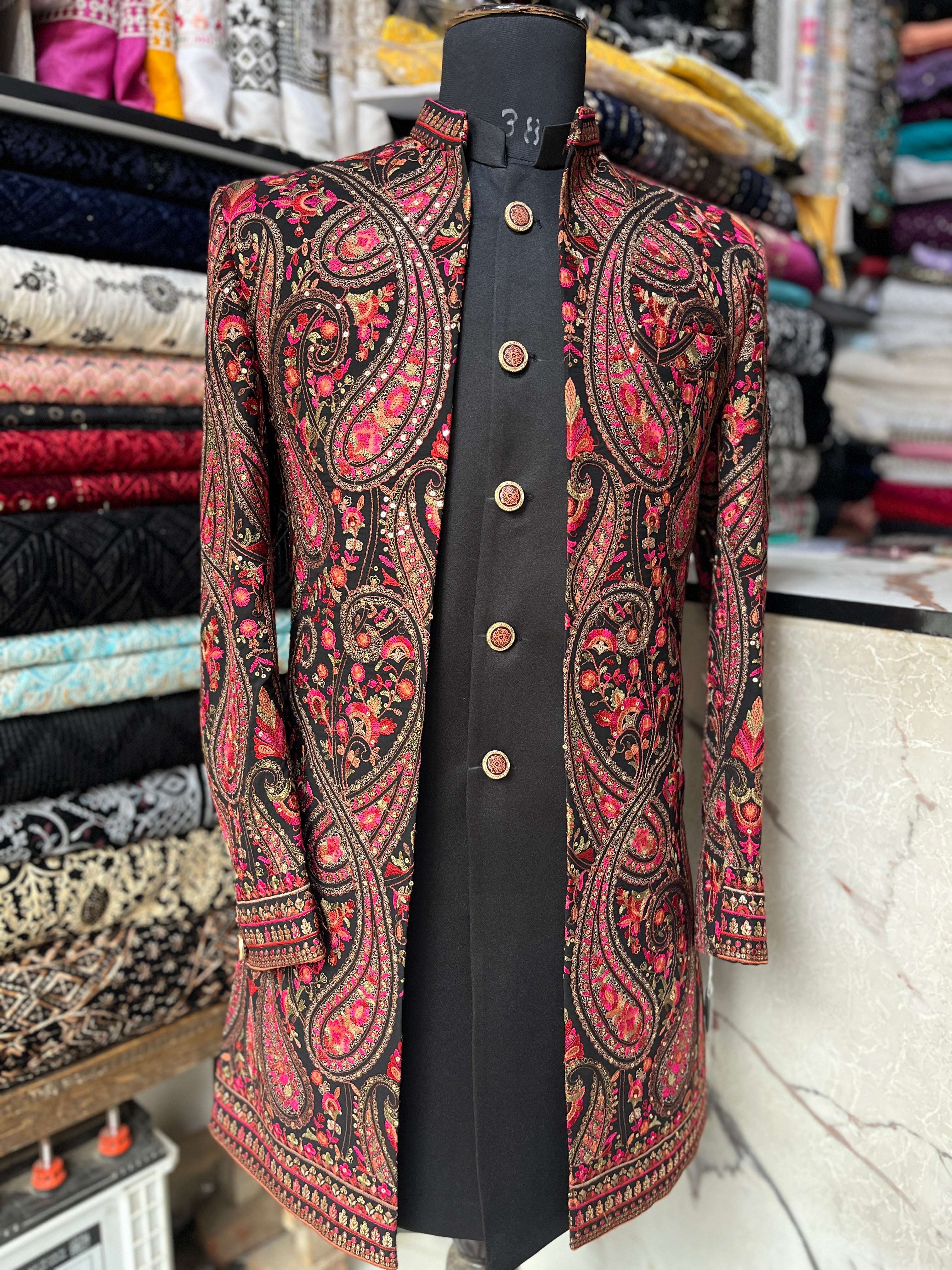 Close-up of Kalamkari embroidery on the jacket.
