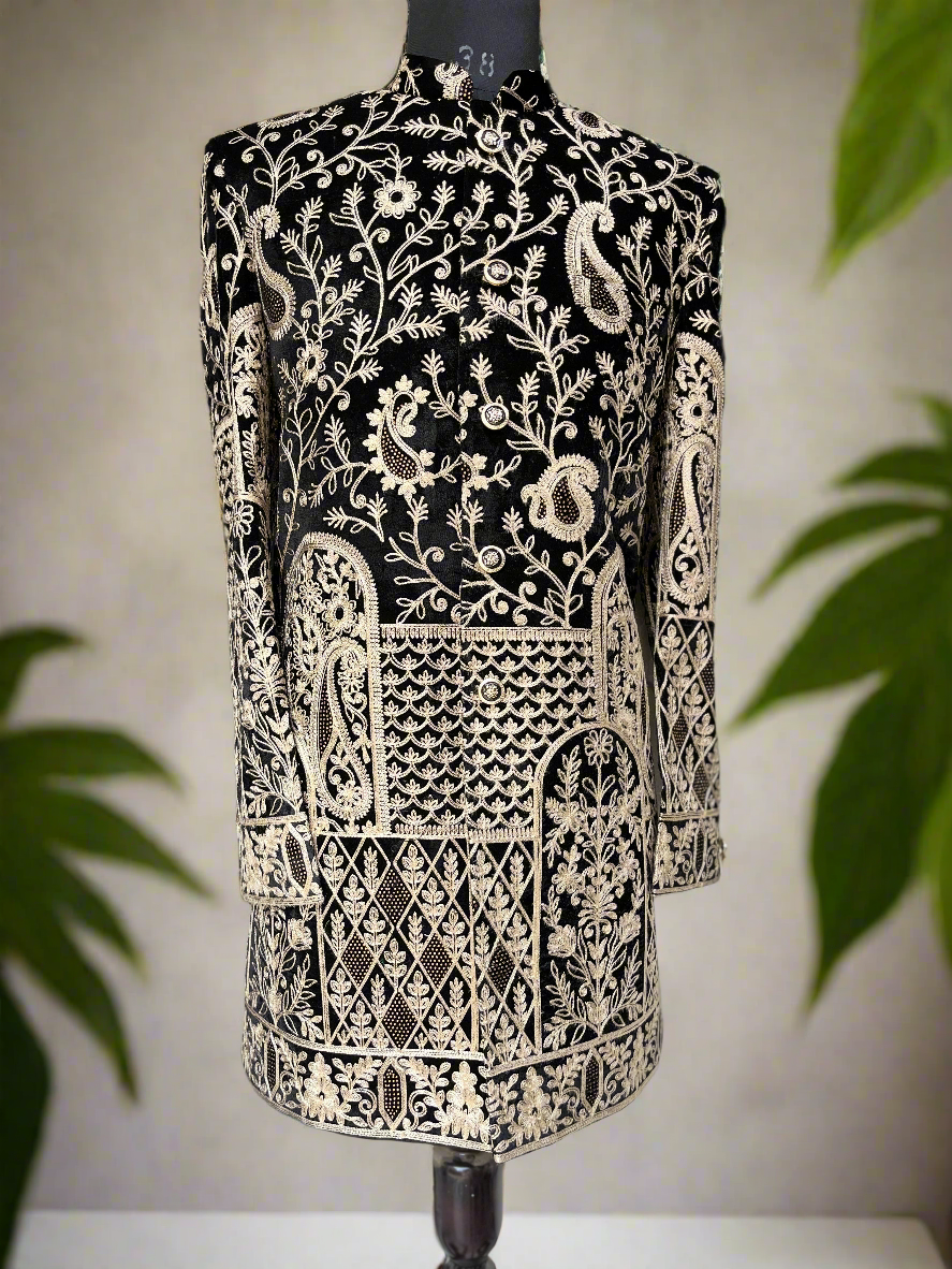 Close-up of multi-color embroidery on a black velvet Indo-Western jacket
