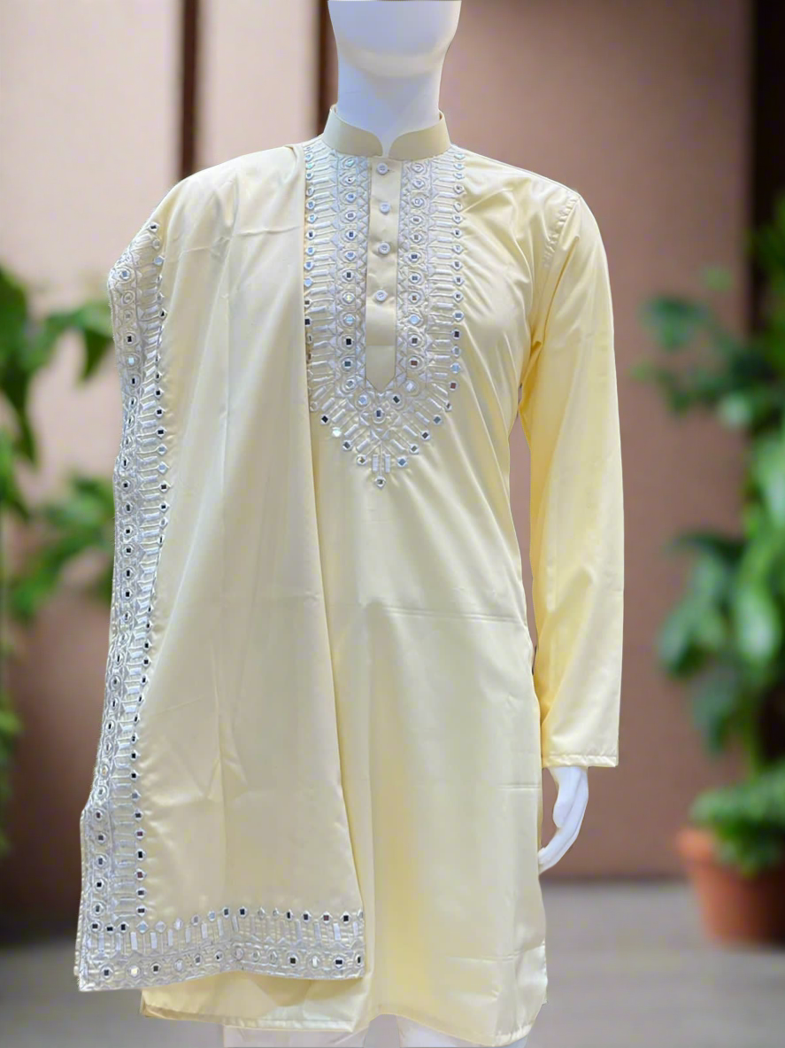 Haldi ceremony kurta set with matching dupatta.