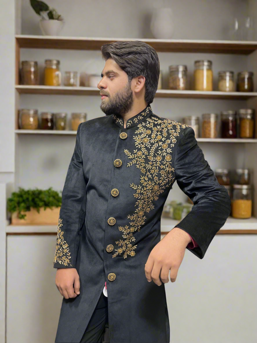 Designer sherwani with six-button closure and regal finish.