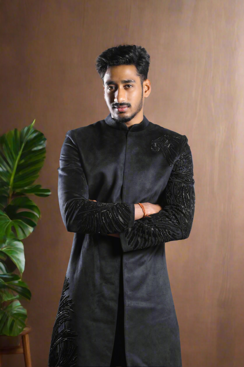 Elegant black designer sherwani set for men.
