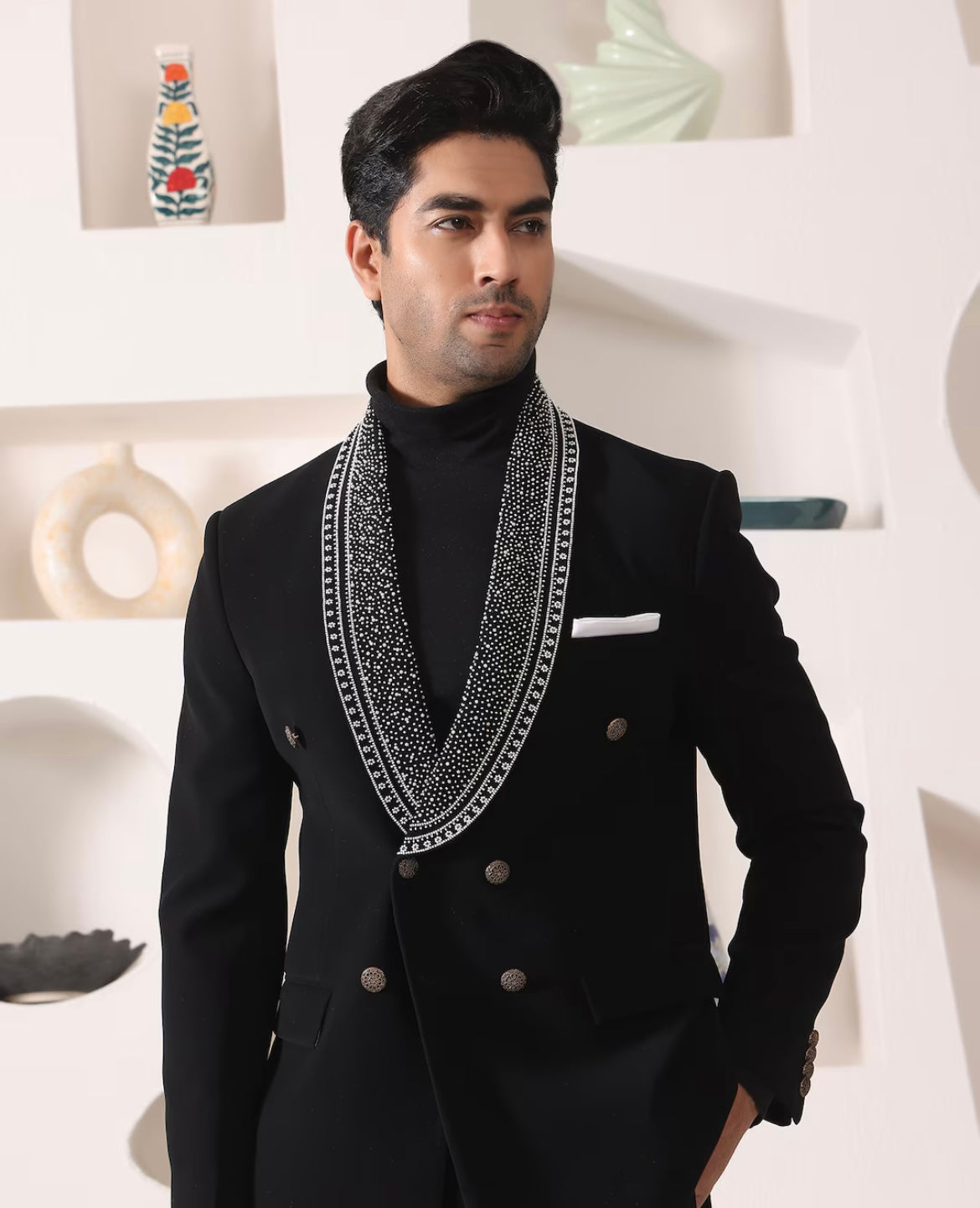 "Elegant black double-breast tuxedo suit for men’s formal occasions"
