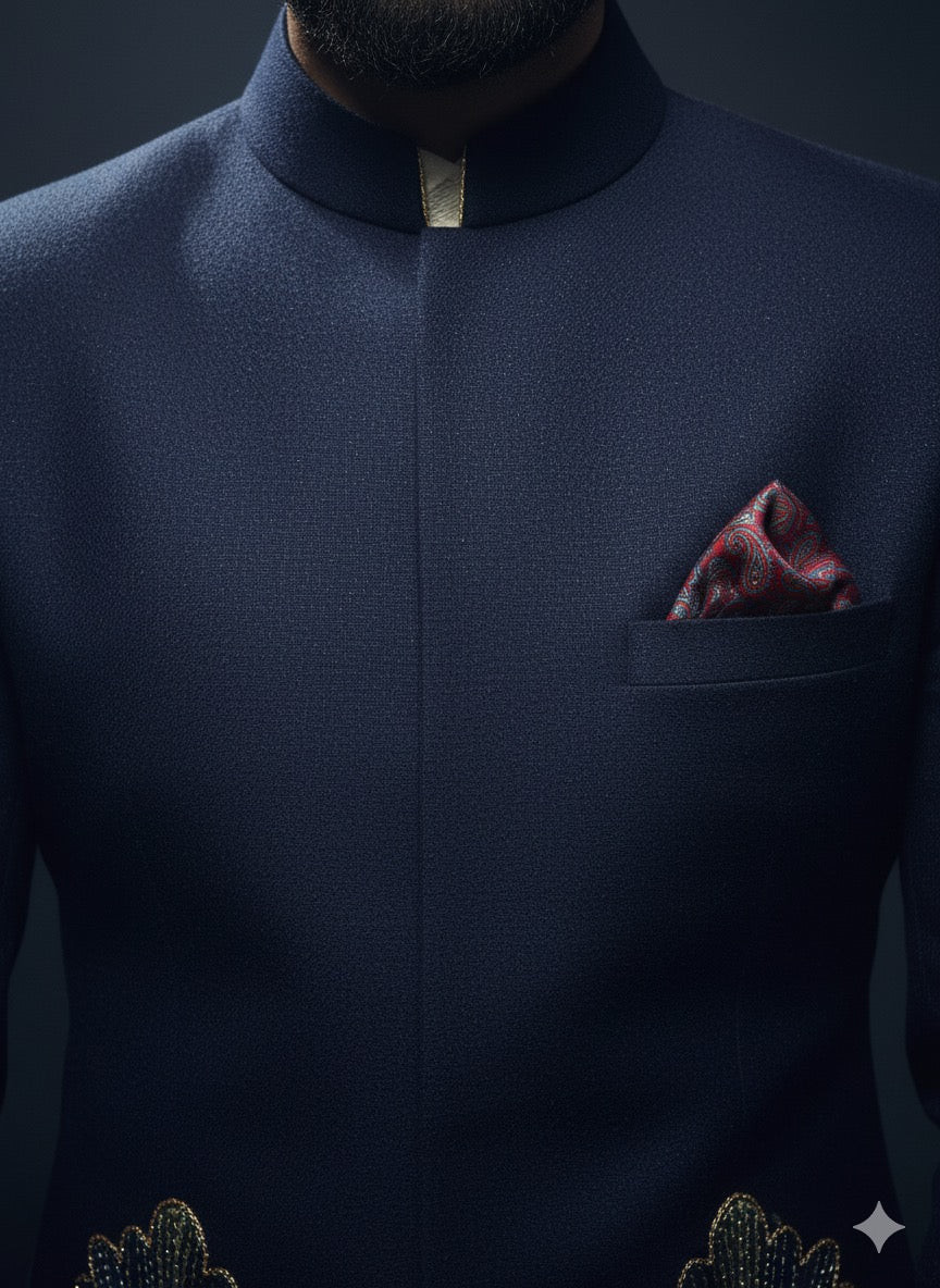 Handcrafted suiting‑fabric bandhgala set featuring floral embroidery