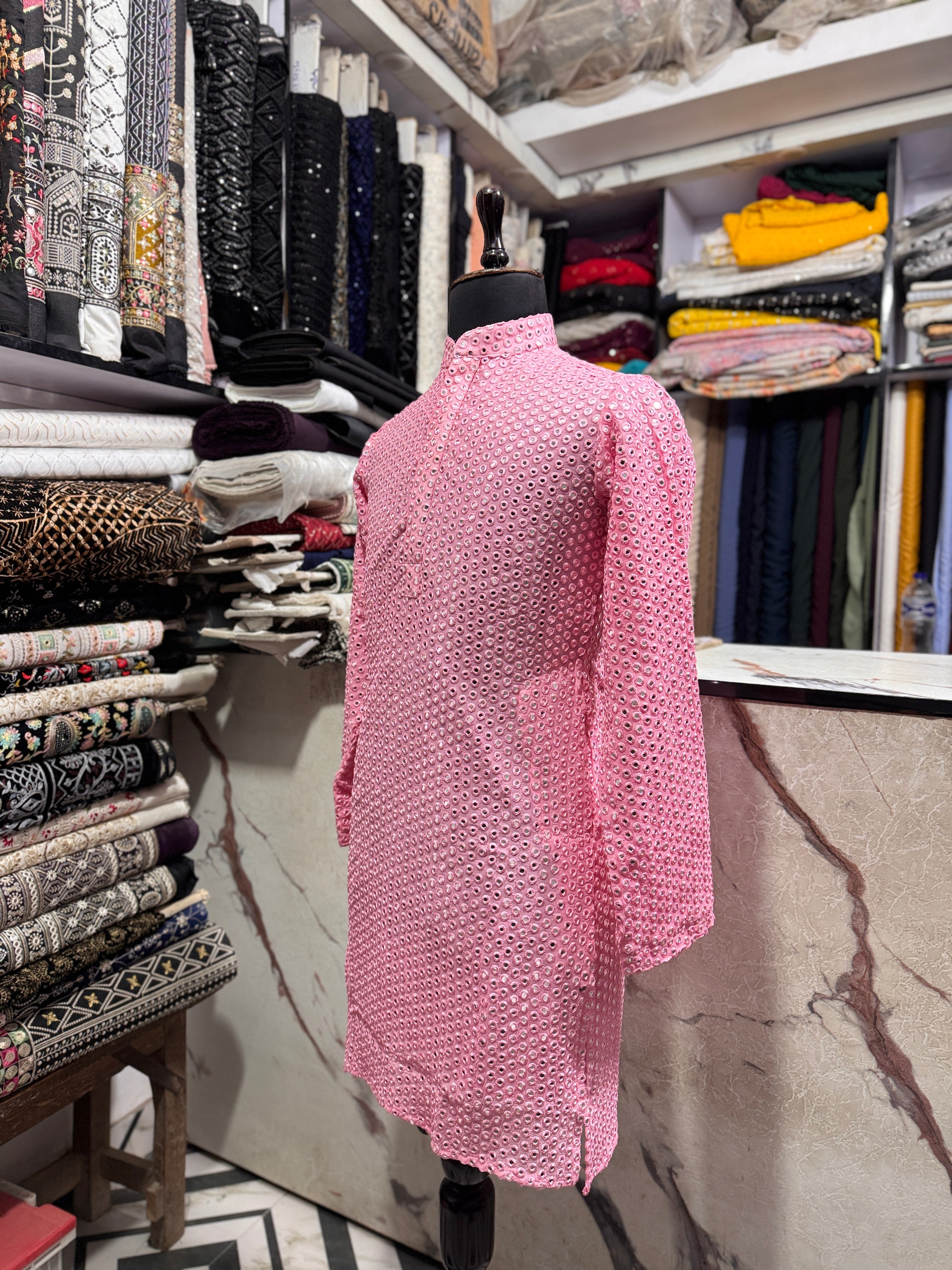 A full-length shot of the kurta set with the pants, highlighting the complete look.

