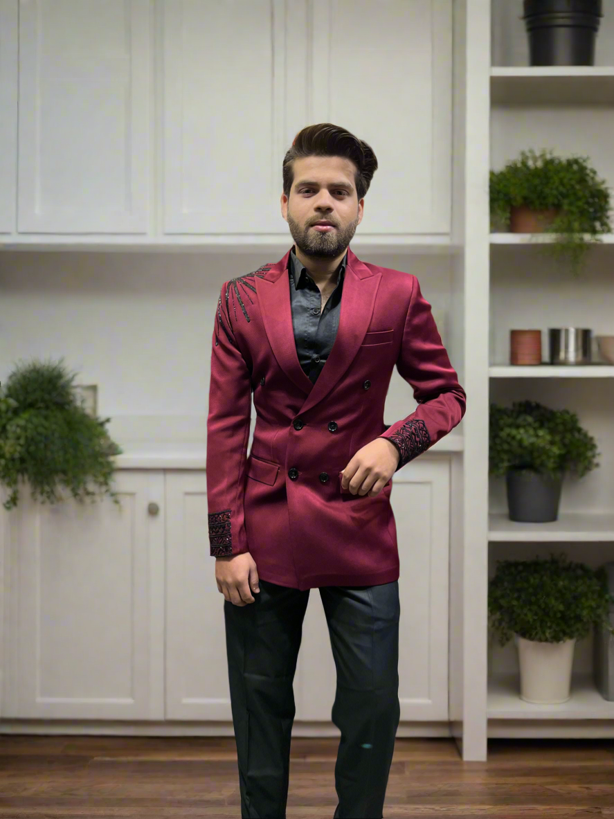 Full-length formal maroon tuxedo by KPH Outfits.
