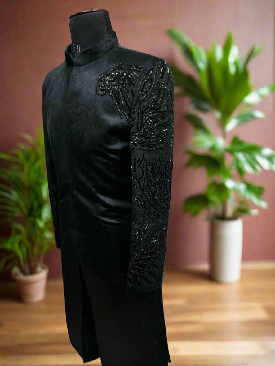 Groom Sherwani in Black Velvet with Gold Embroidery.
