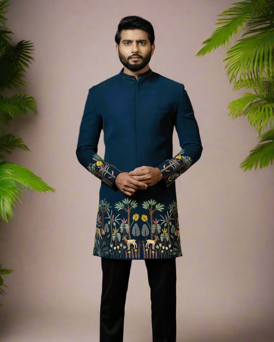 "Groom wearing a handcrafted velvet sherwani with multicolor embroidery."
