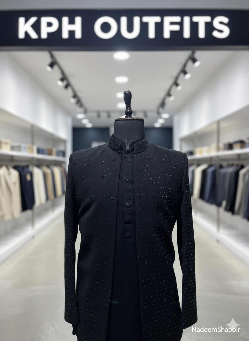 Close-up of the delicate cut dana and bead detailing on the Armani shrug collar.