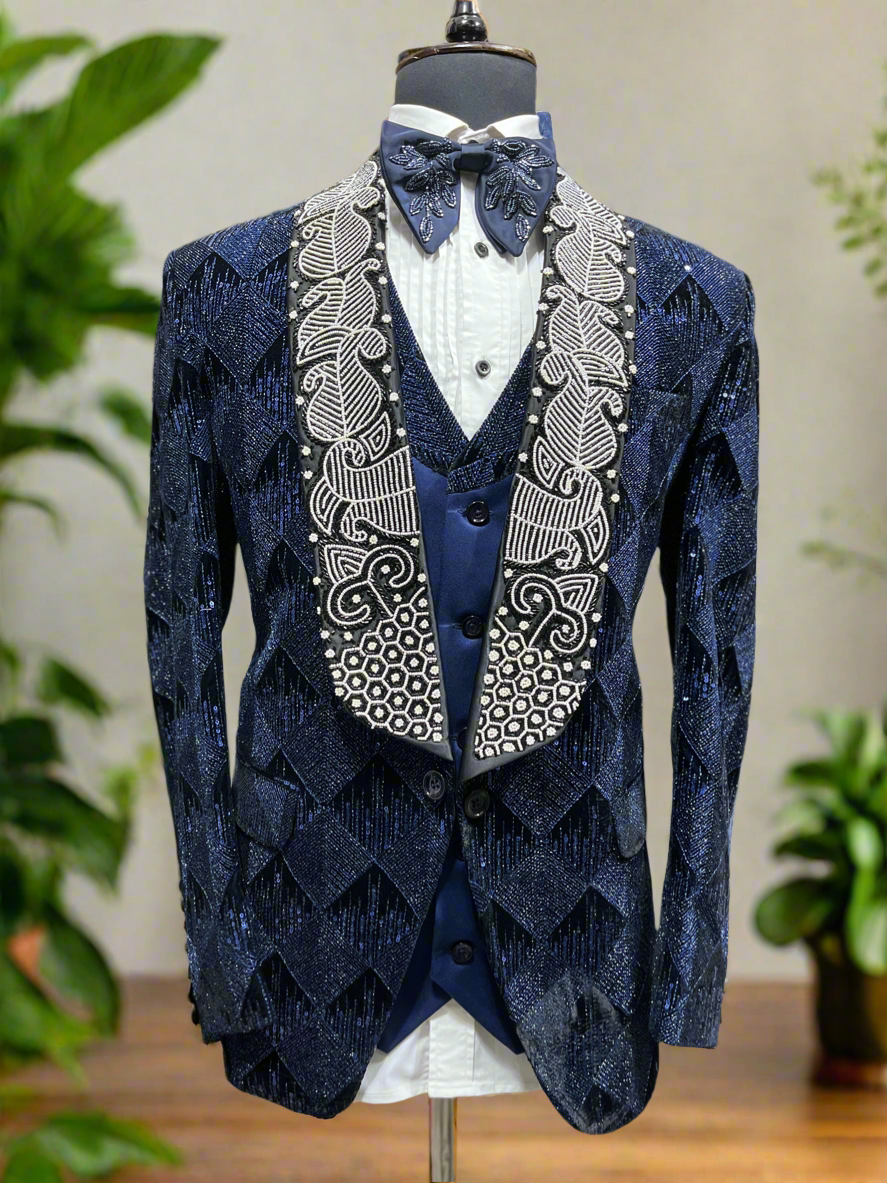 Luxurious men's navy blue shawl lapel tuxedo.
