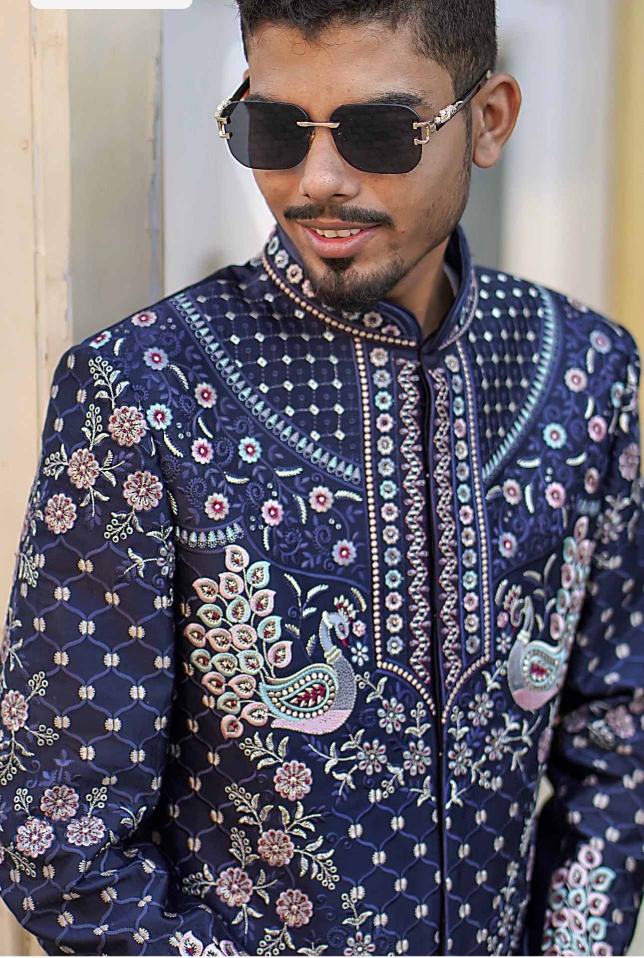 Luxury navy blue wedding sherwani with intricate handwork