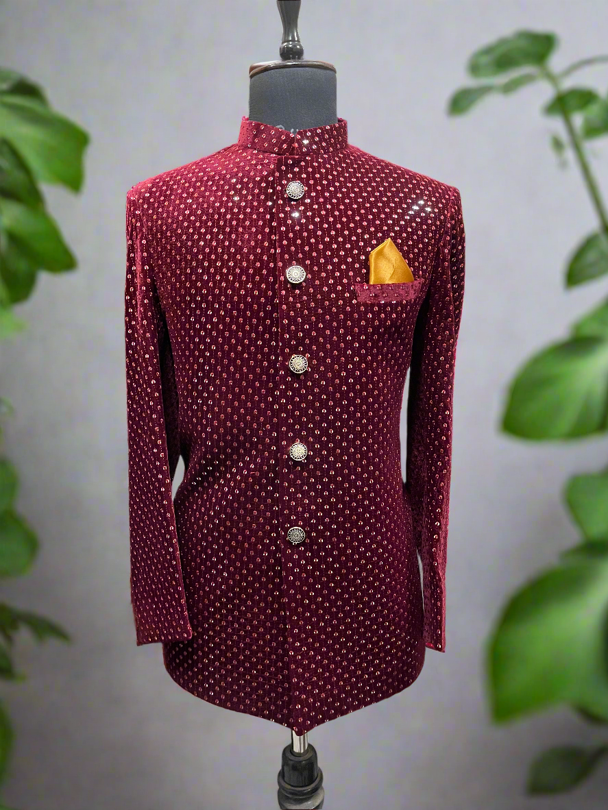 Maroon velvet Jodhpuri set with 5-button blazer and zipper pants.