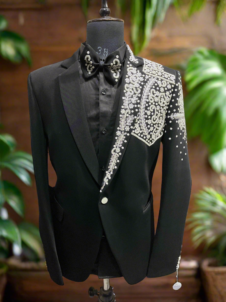 Men's black tuxedo with handcrafted beads work.
