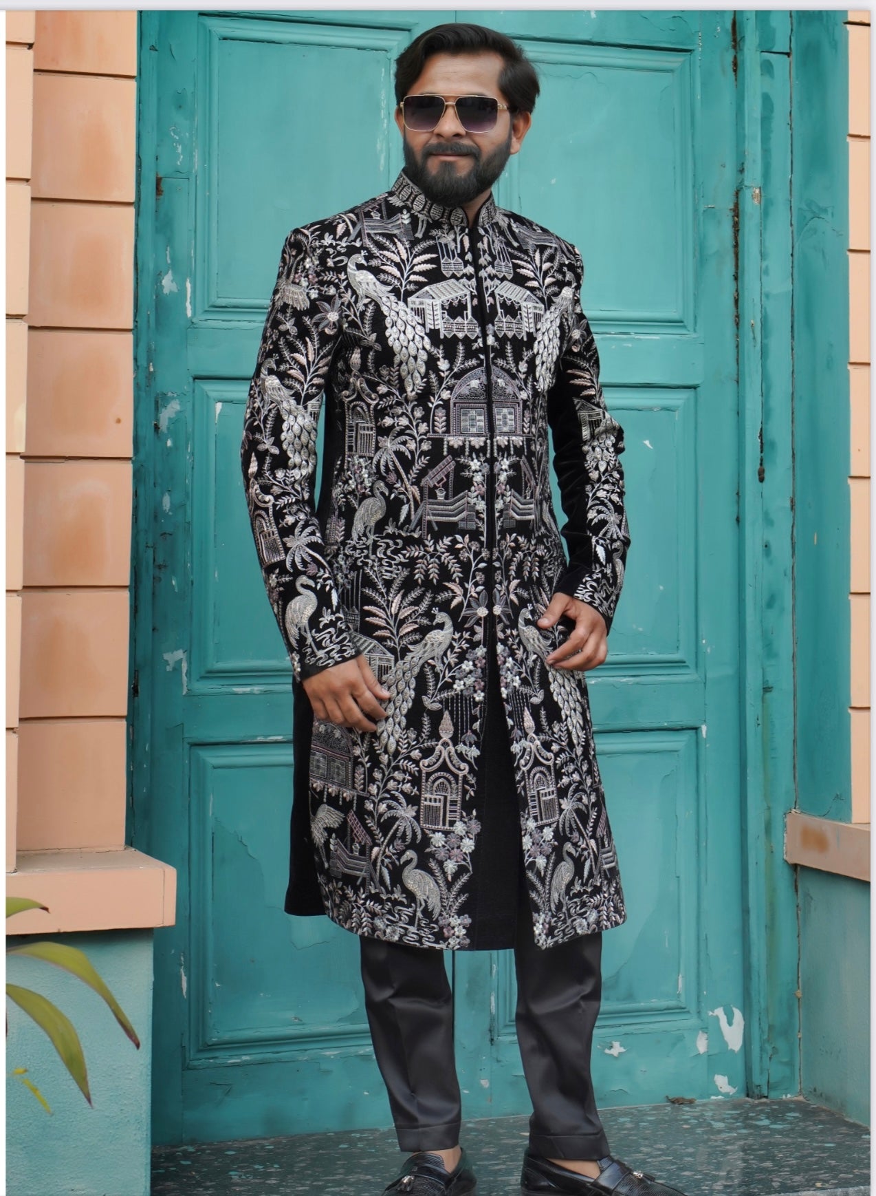 Men’s exclusive black sherwani with intricate embellishments