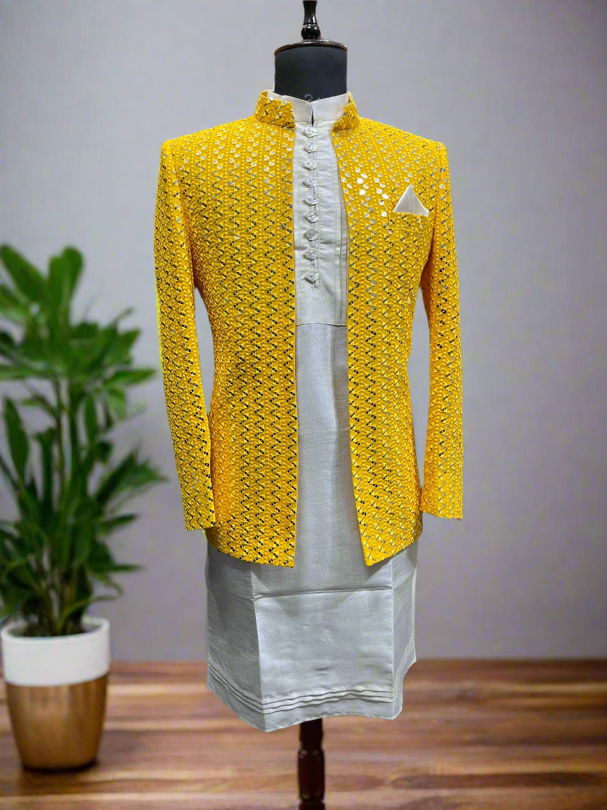 Men's yellow Jodhpuri set with mirror work blazer.
