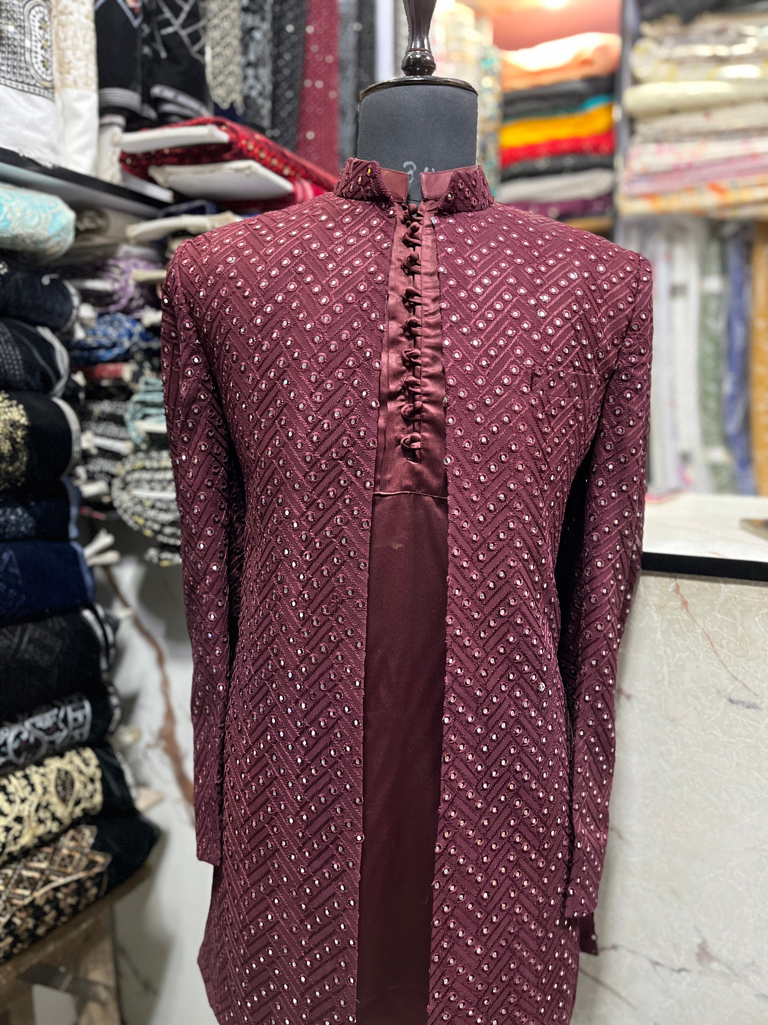 Side View of Men's Maroon Kurta and Blazer Set
