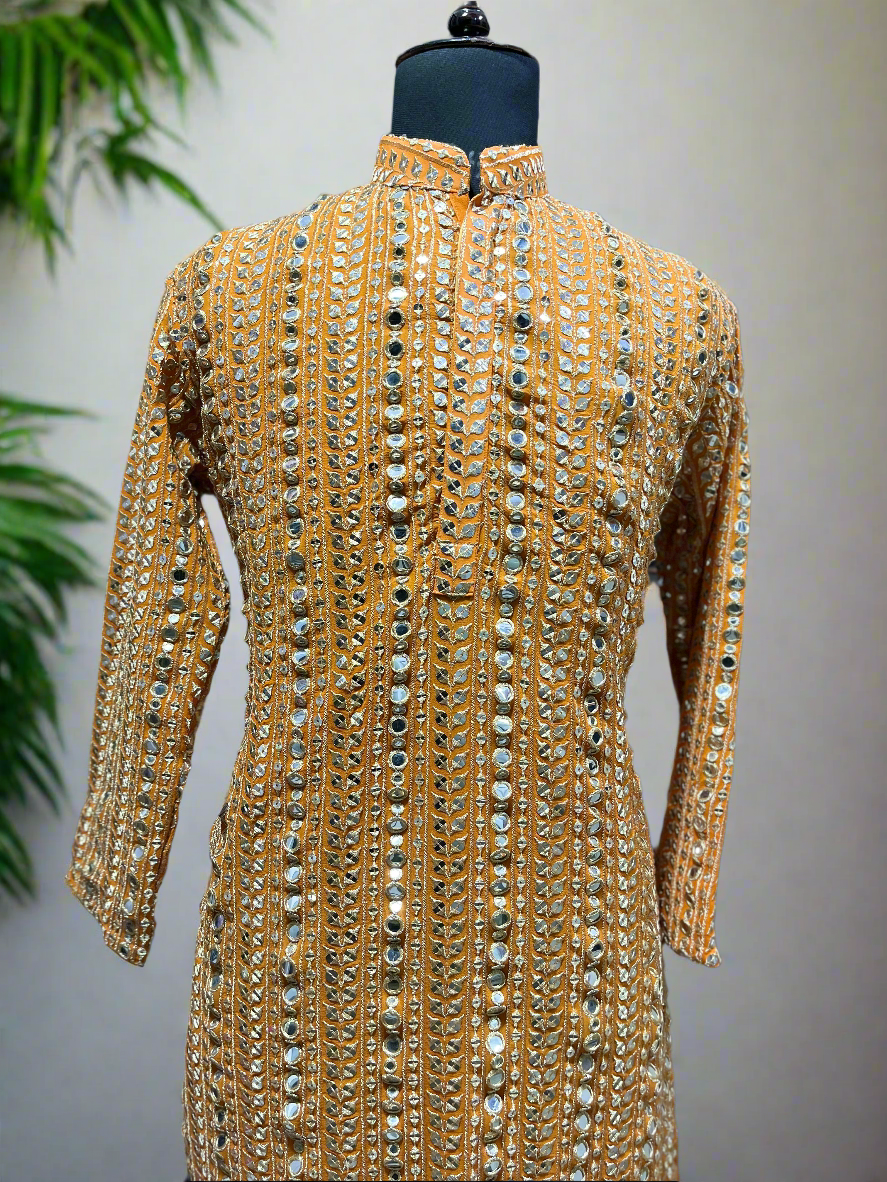 Traditional kurta set with sequin and mirror detailing. 