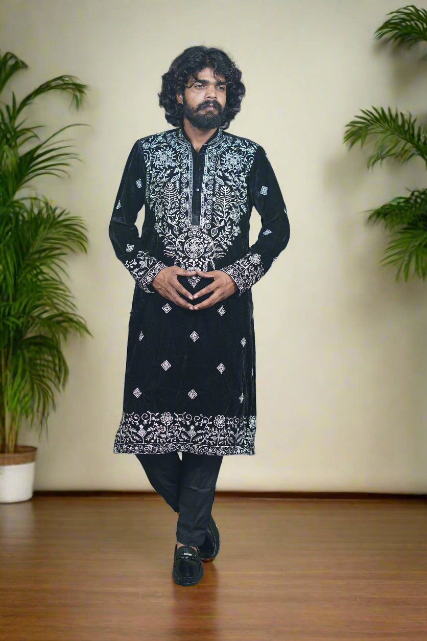 Elegant black velvet kurta featuring intricate silver embroidery details.
